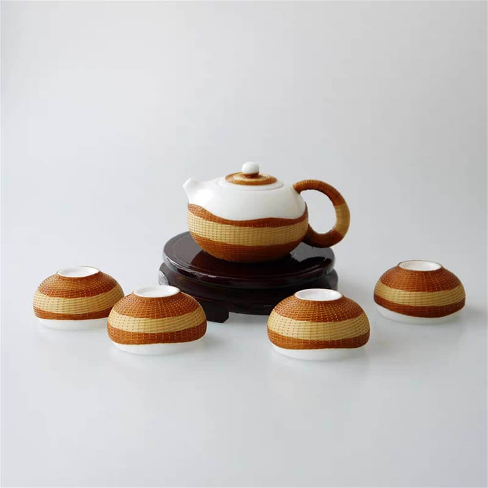 One pot and four cups of high-grade bone china woven with porcelain body