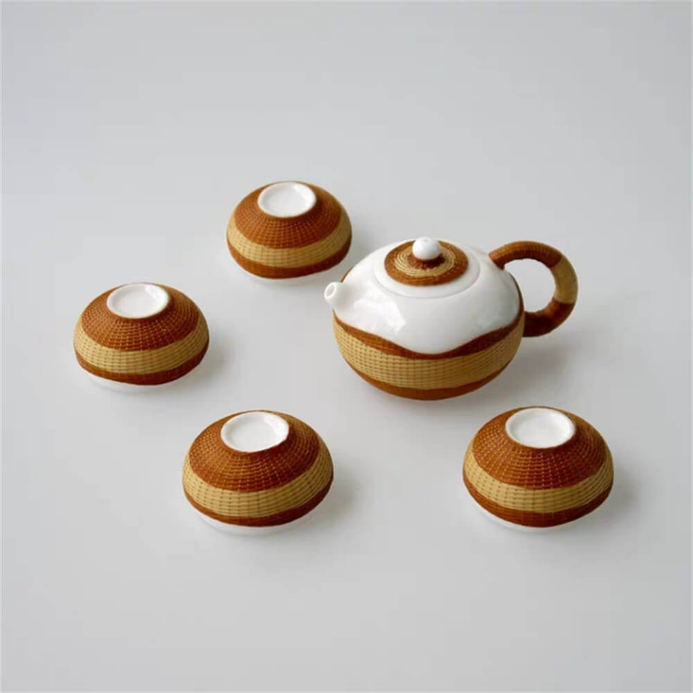 One pot and four cups of high-grade bone china woven with porcelain body