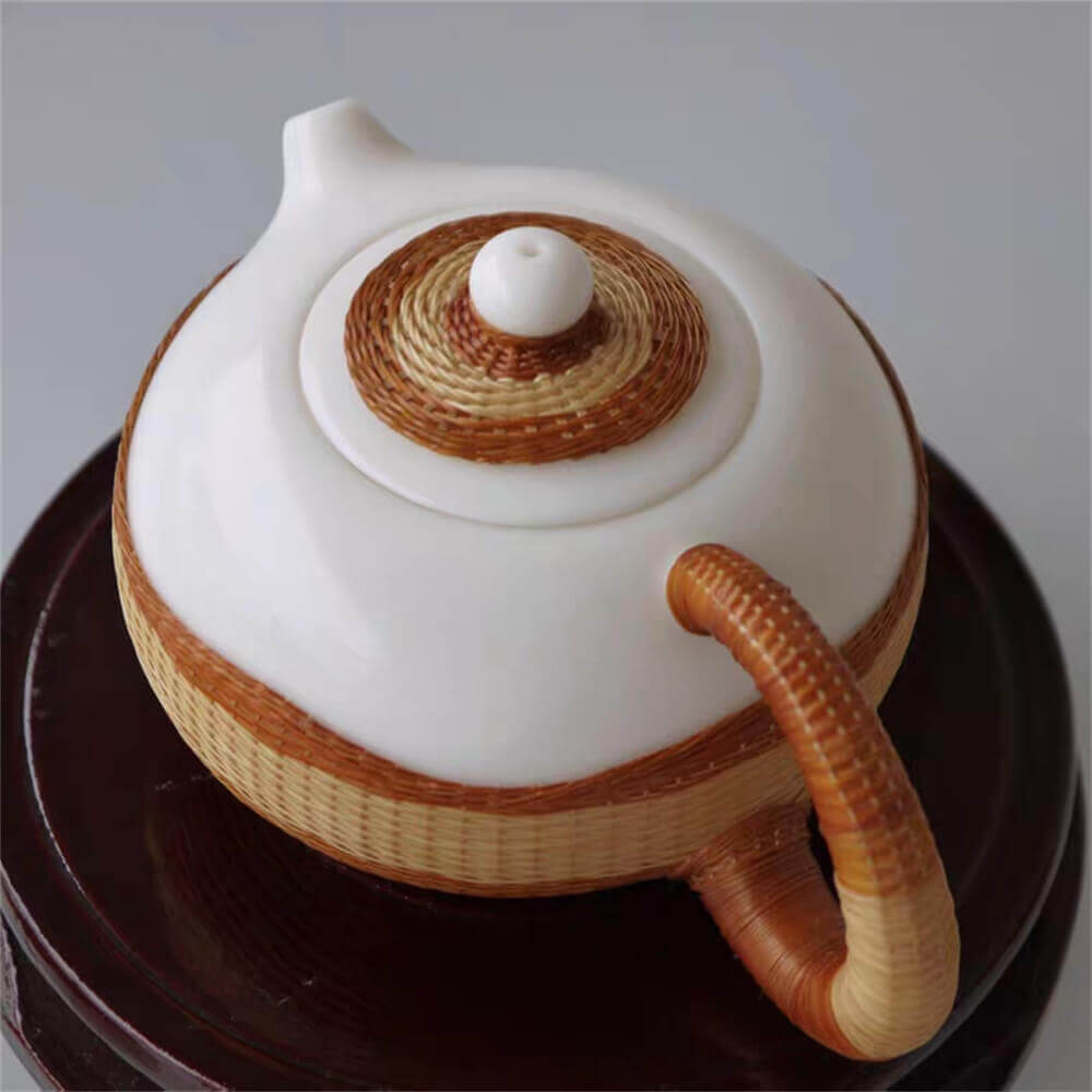 One pot and four cups of high-grade bone china woven with porcelain body