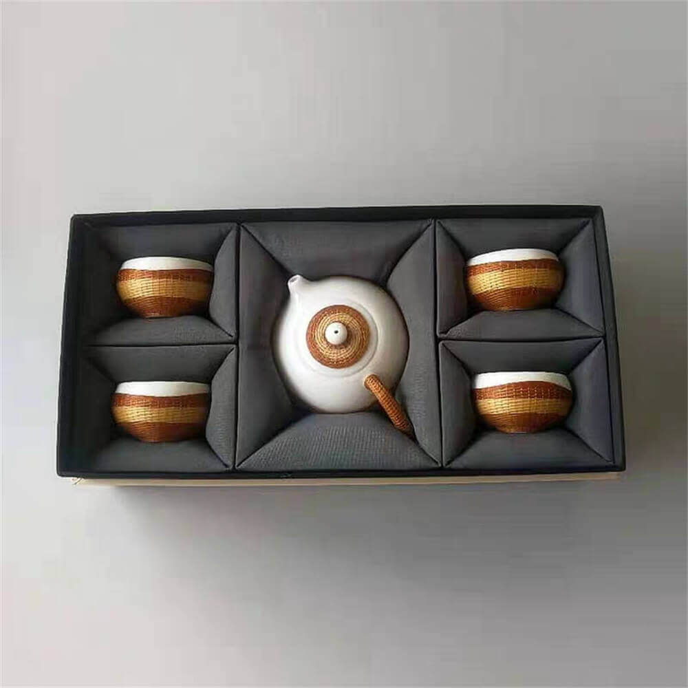 One pot and four cups of high-grade bone china woven with porcelain body
