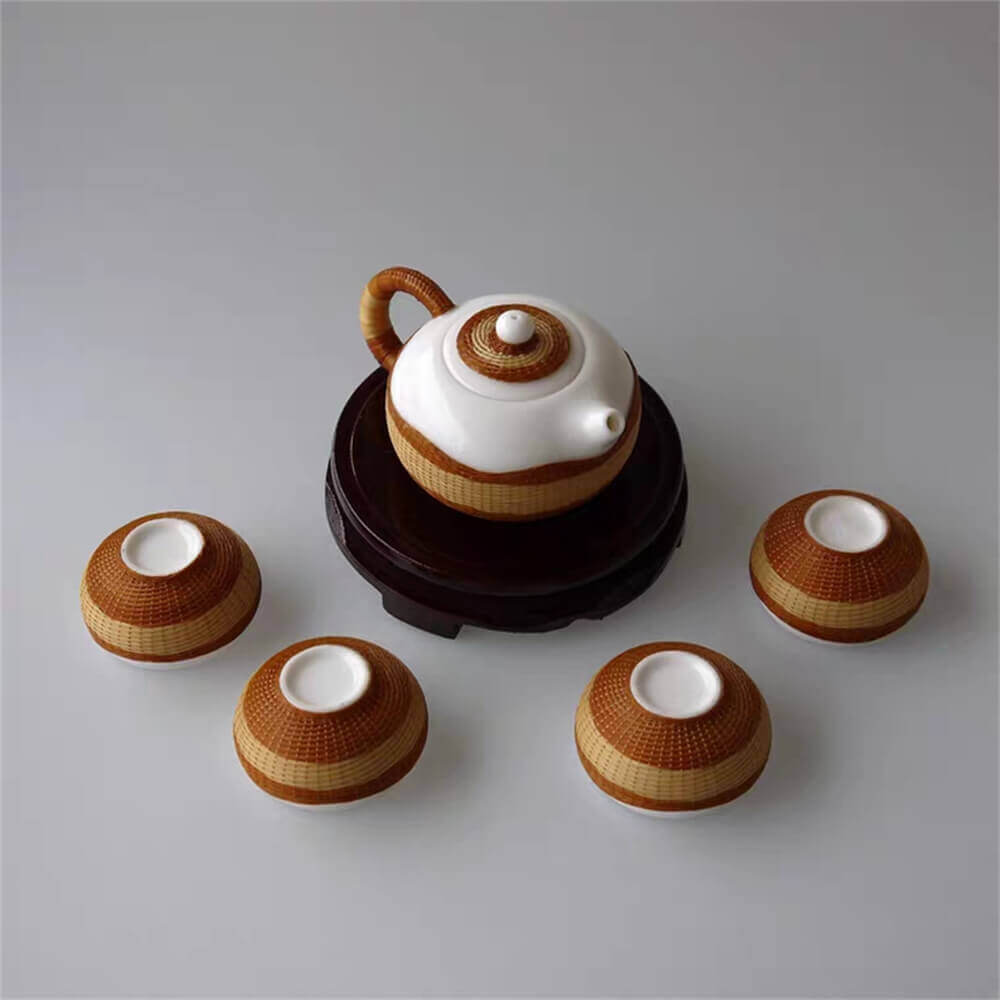 One pot and four cups of high-grade bone china woven with porcelain body