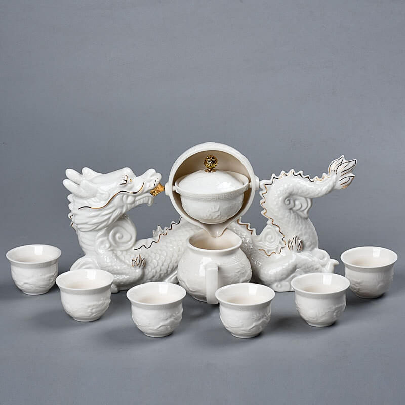 https://sheamenceramic.com/cdn/shop/products/8-pcs-set-ceramics-Lazy-Man-Tea-Set-Portable-semi-automatic-tea-infuser-Oolong-teacup-filter_53372186-6a69-4e33-8c05-23afd6eafb90_800x.jpg?v=1655698736